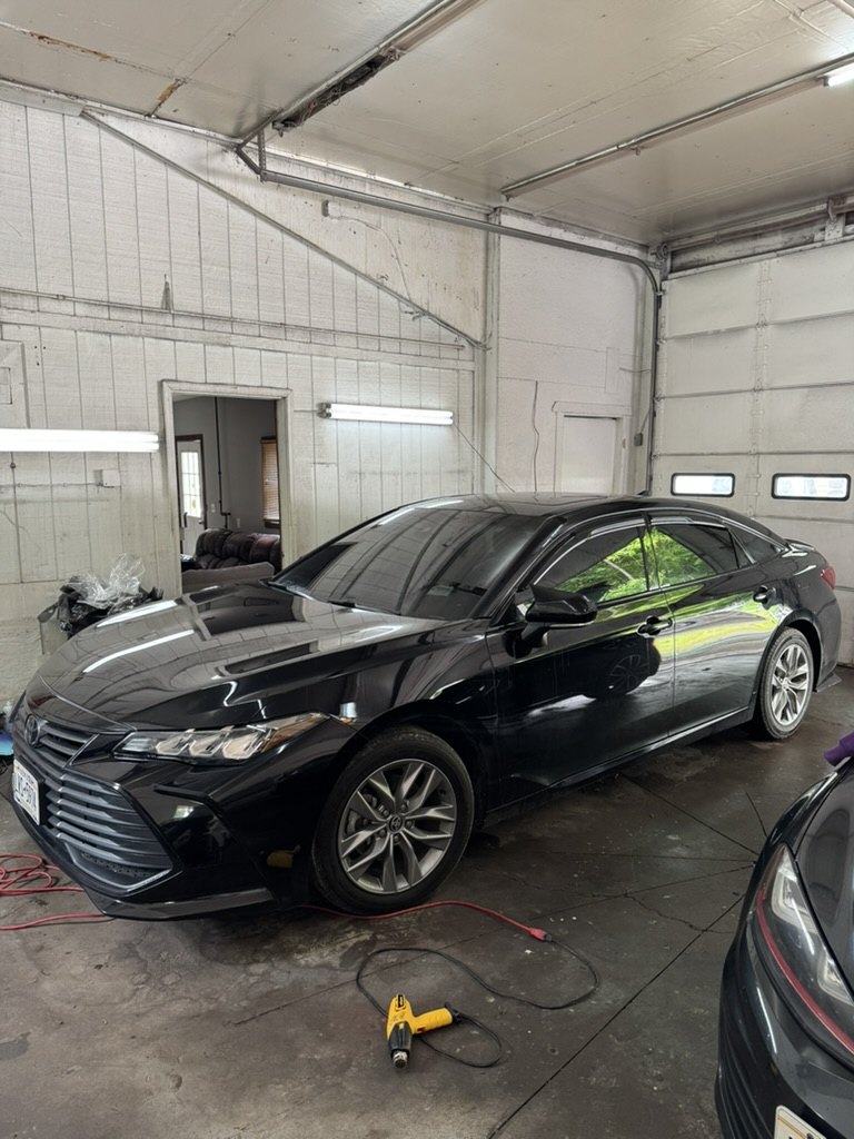 Black Toyota Avalon getting window tint