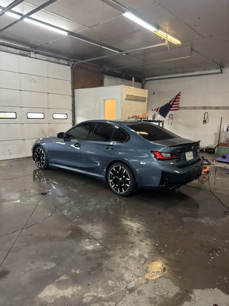 Blue BMW M3 with glossy paint