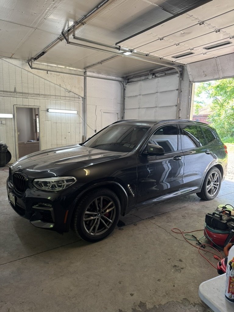 Black BMW X3 with window tint